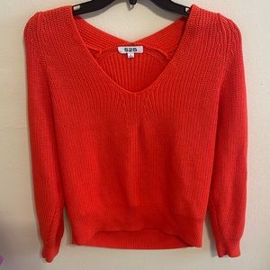 Orange cotton sweater. 525